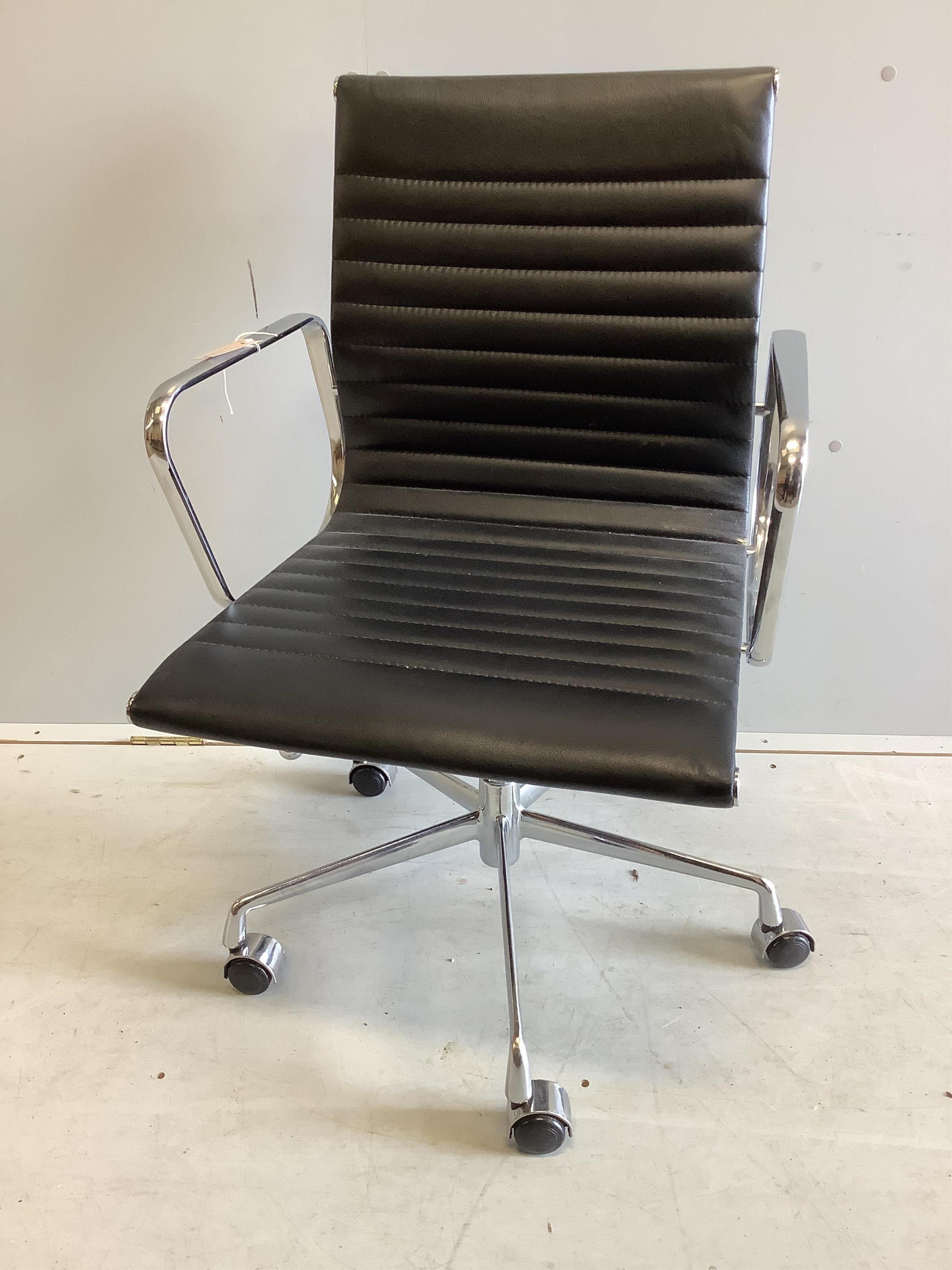 An Eames style desk chair, width 58cm, depth 50cm, height 90cm